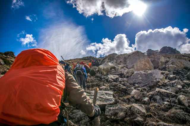 people hiking on mountain