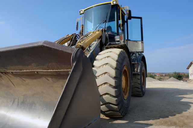 big bulldozer clear sky construction