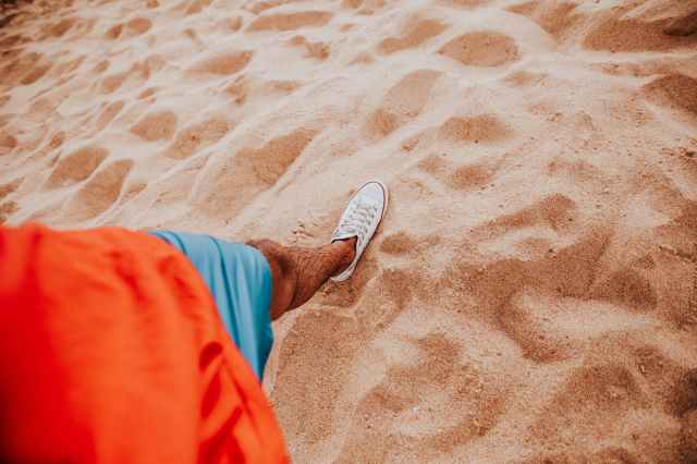 person wearing white shoe