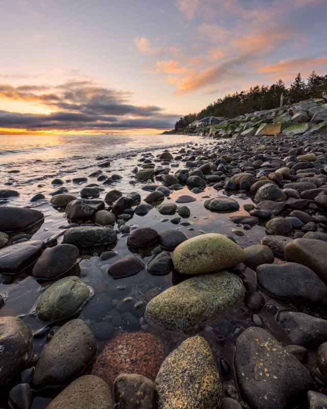 photo of rocky seashore during golden hour
